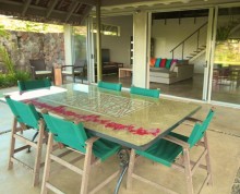 The Villa patio by night with undercover table and chairs for 6 - Ifiele'ele Plantation luxury self-contained holiday home in Samoa