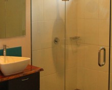 The Studio bathroom at Ifiele'ele Plantation luxury self-catering holiday rental in Samoa